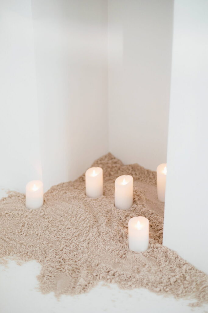 photo studio with sand and candles