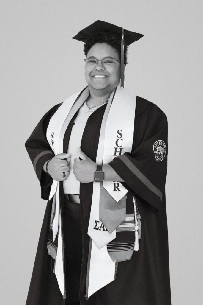 Black and white senior graduate studio portrait in Jacksonville, FL featuring timeless high school graduation photography.
