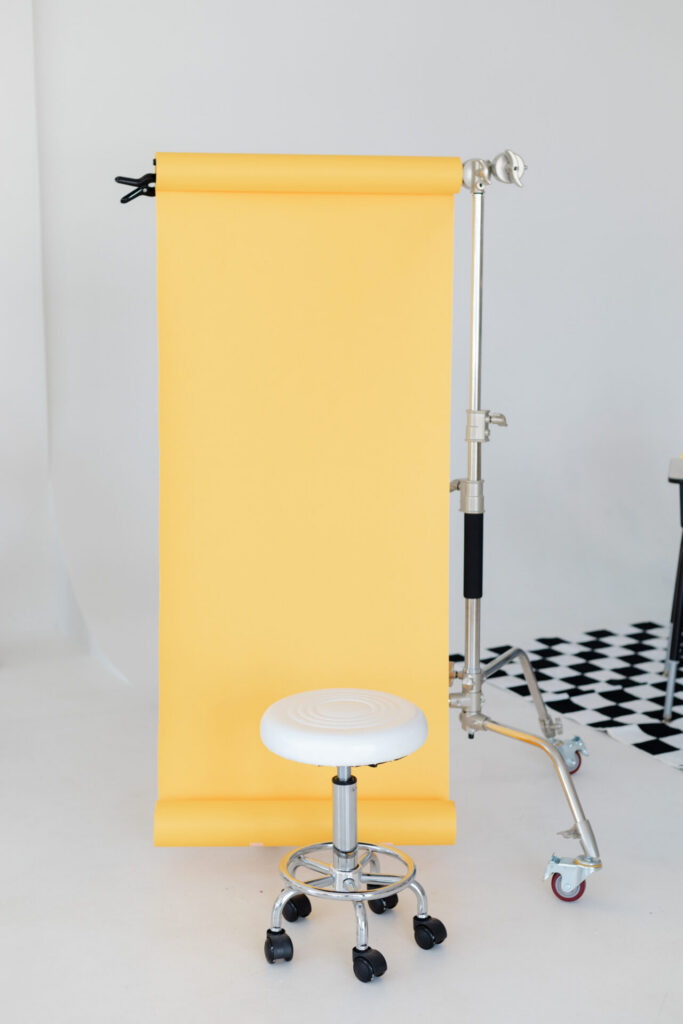 yellow backdrop on a c stand