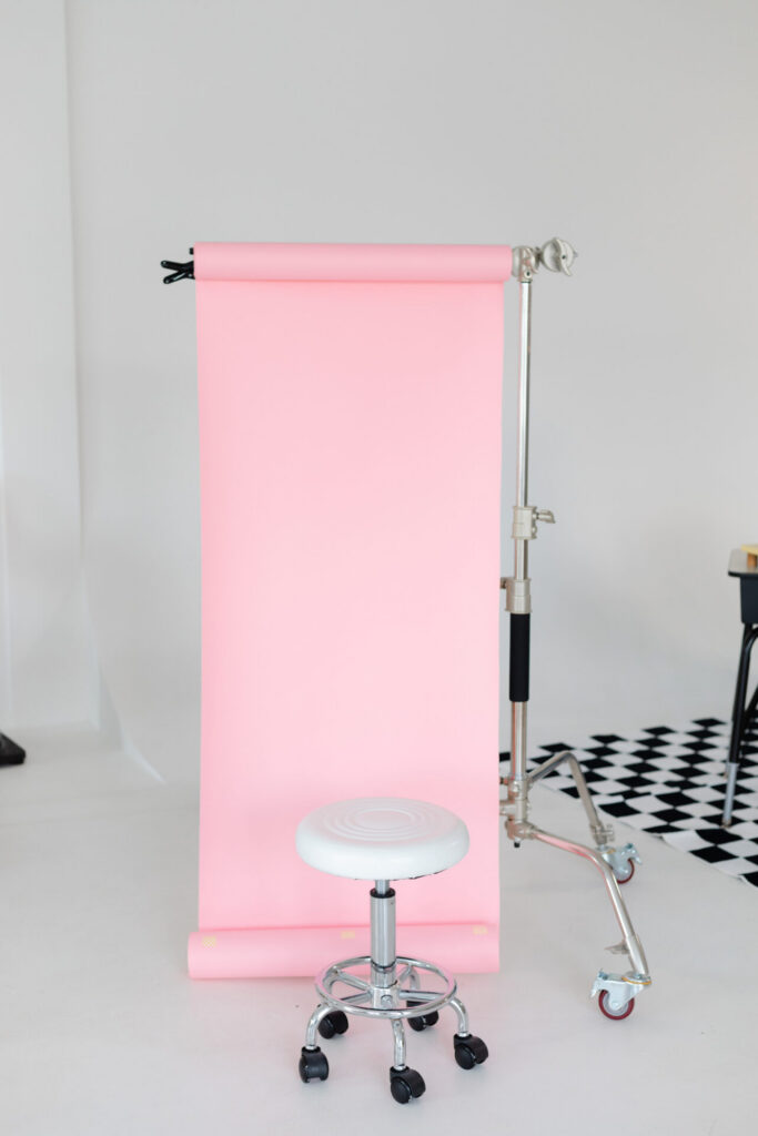 a light pink backdrop for personality headshots 