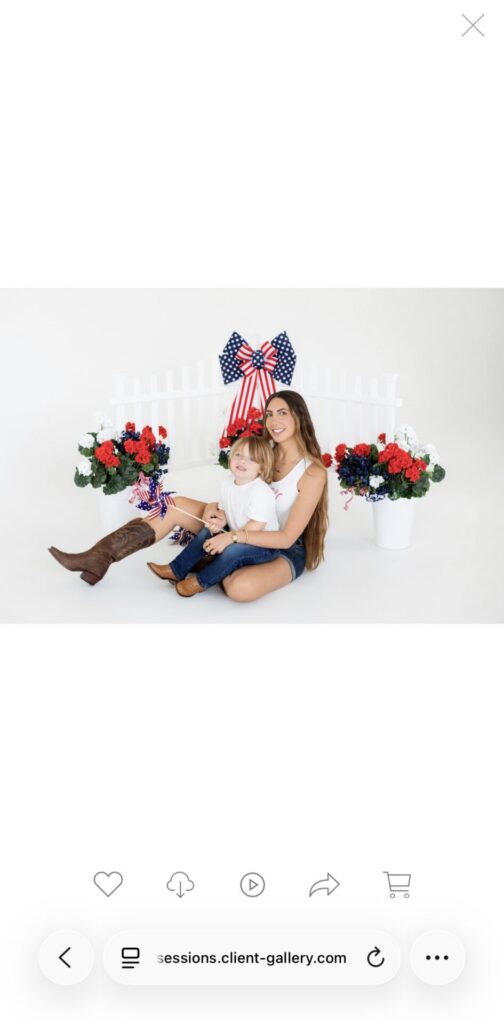 Mobile view of an individual image inside an online client photo gallery with options to favorite, share, download, and purchase products.